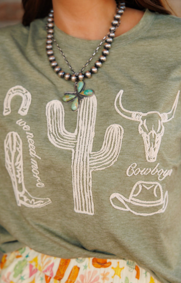 We Need More Cowboys Sage Tee